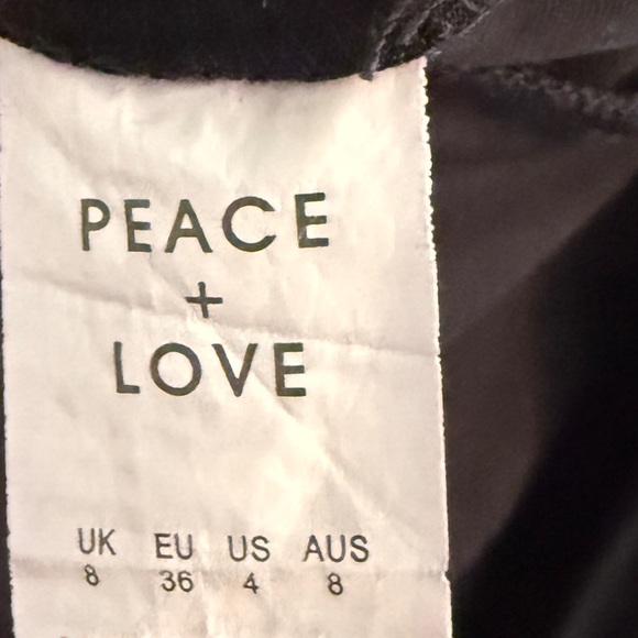 Missguided Peace and Love Plunge
Front Bandage Bodysuit - Picture 6 of 6